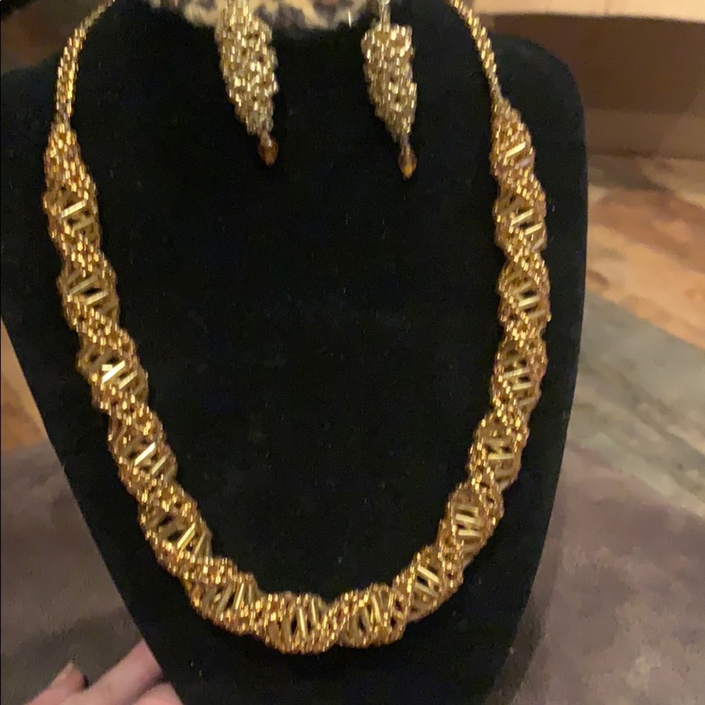Gold choker and earrings